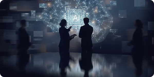Two colleagues reviewing an AI-driven data network visualisation
