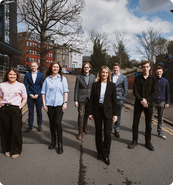 The chillicommerce eCommerce and AI team standing together outdoors