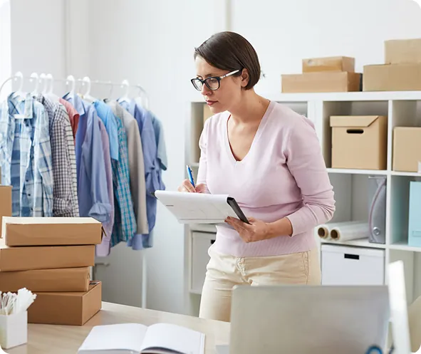 Warehouse team managing product and stock data with the help of AI tools