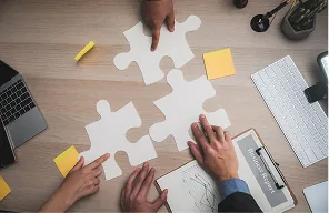 Team mapping out a bespoke AI application around a real business problem